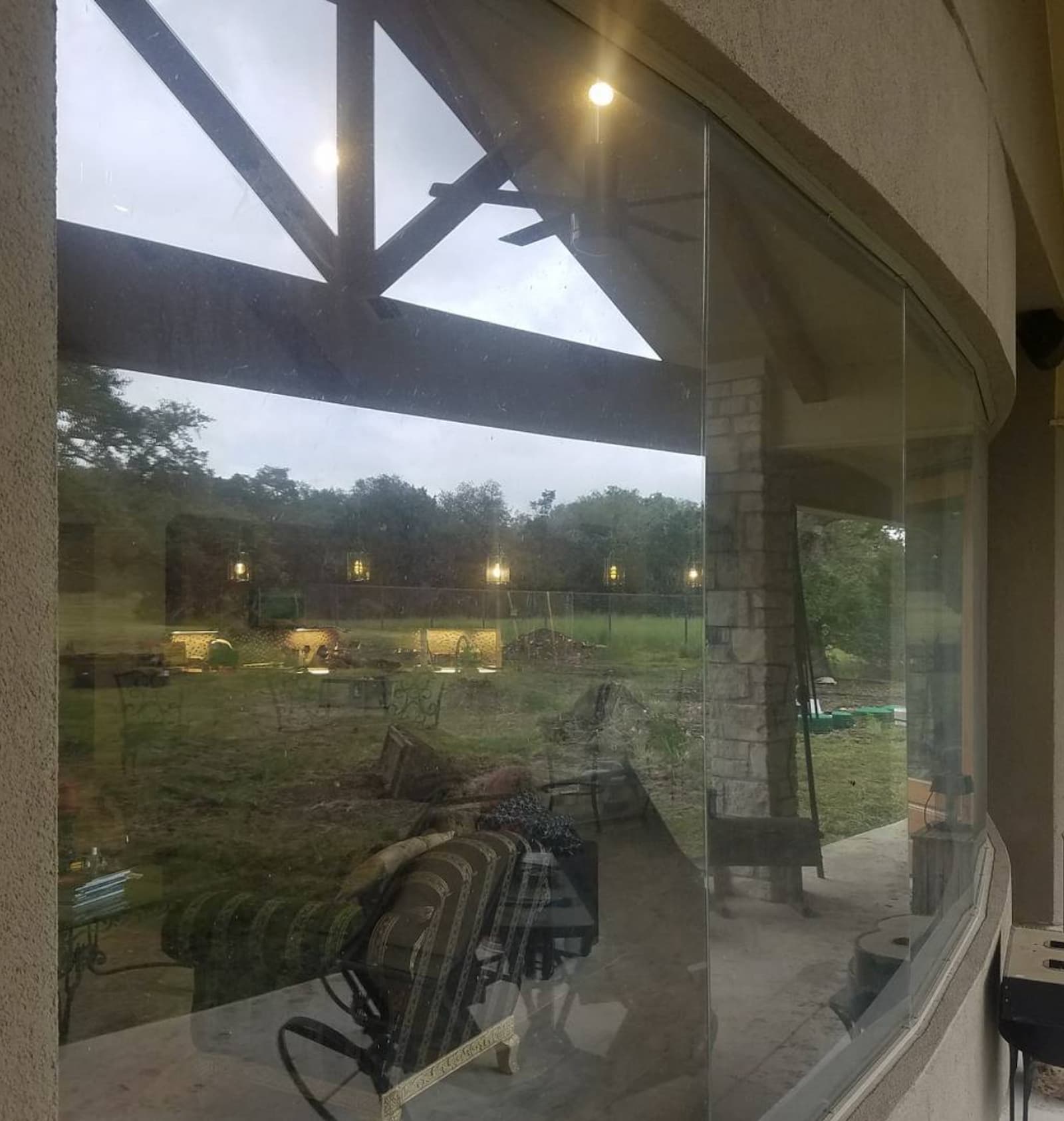 Window with hard water spots before cleaning — Fredericksburg TX window cleaning by No Spot Tech